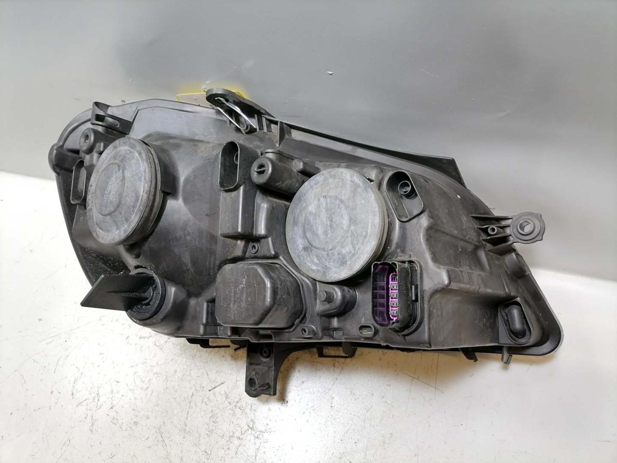 VW Polo 9N3 original Scheinwerfer vorn links Halogen Bj.2006